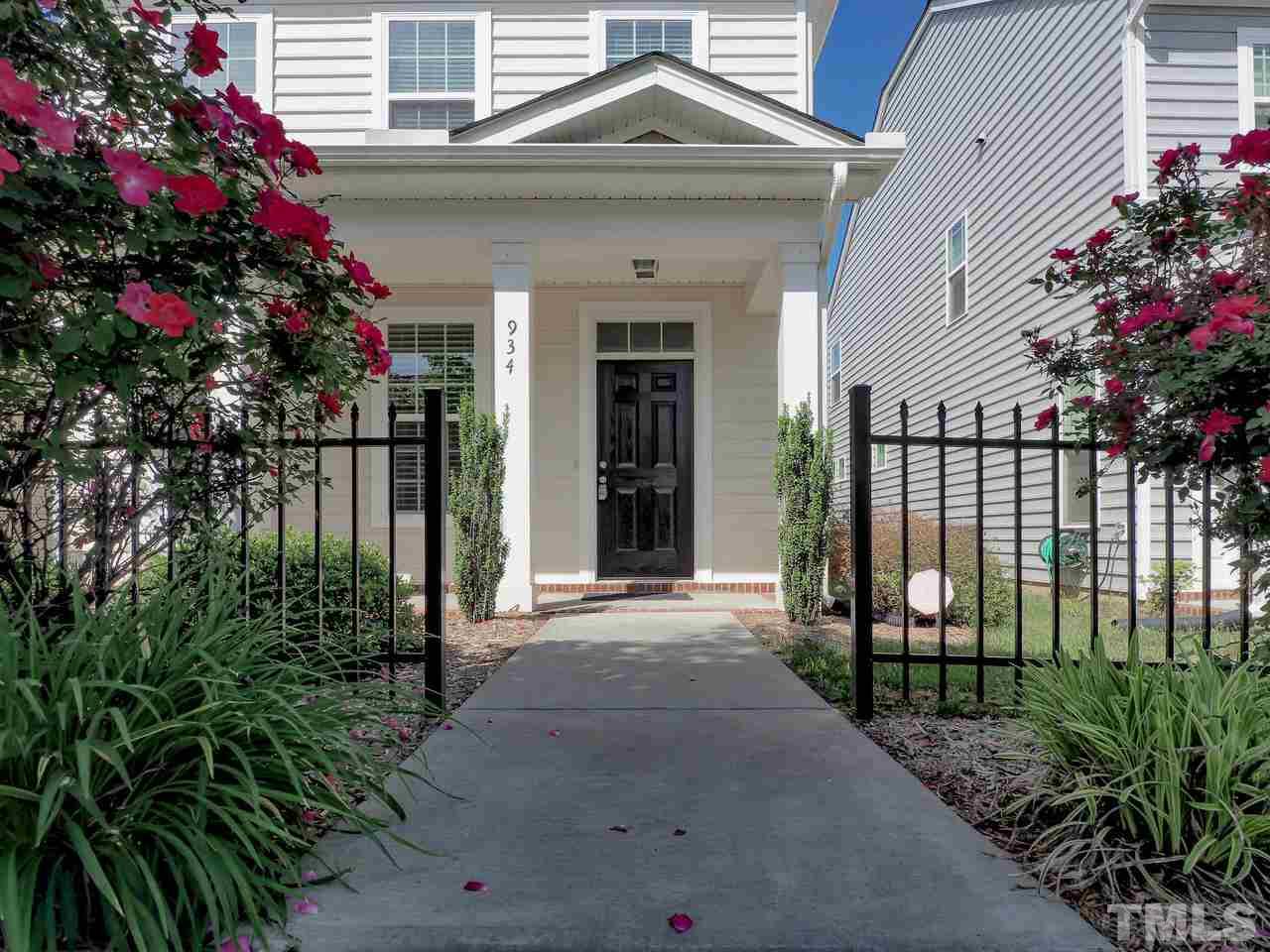 934 Ileagnes Road Raleigh, NC 27603 - Photo 2 of 23 a front view of a house having fountain