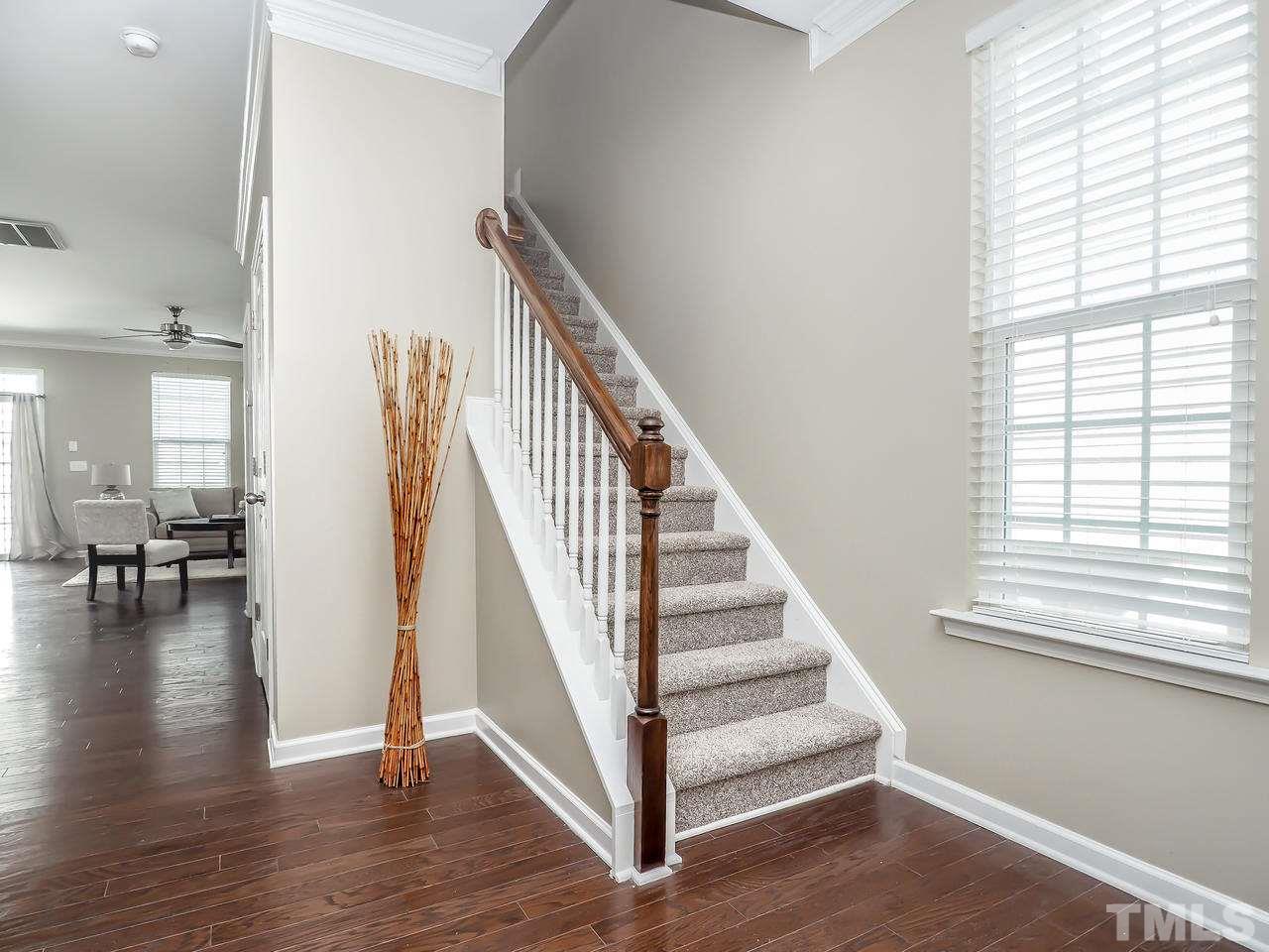 934 Ileagnes Road Raleigh, NC 27603 - Photo 11 of 23 a view of entryway and hall with wooden floor