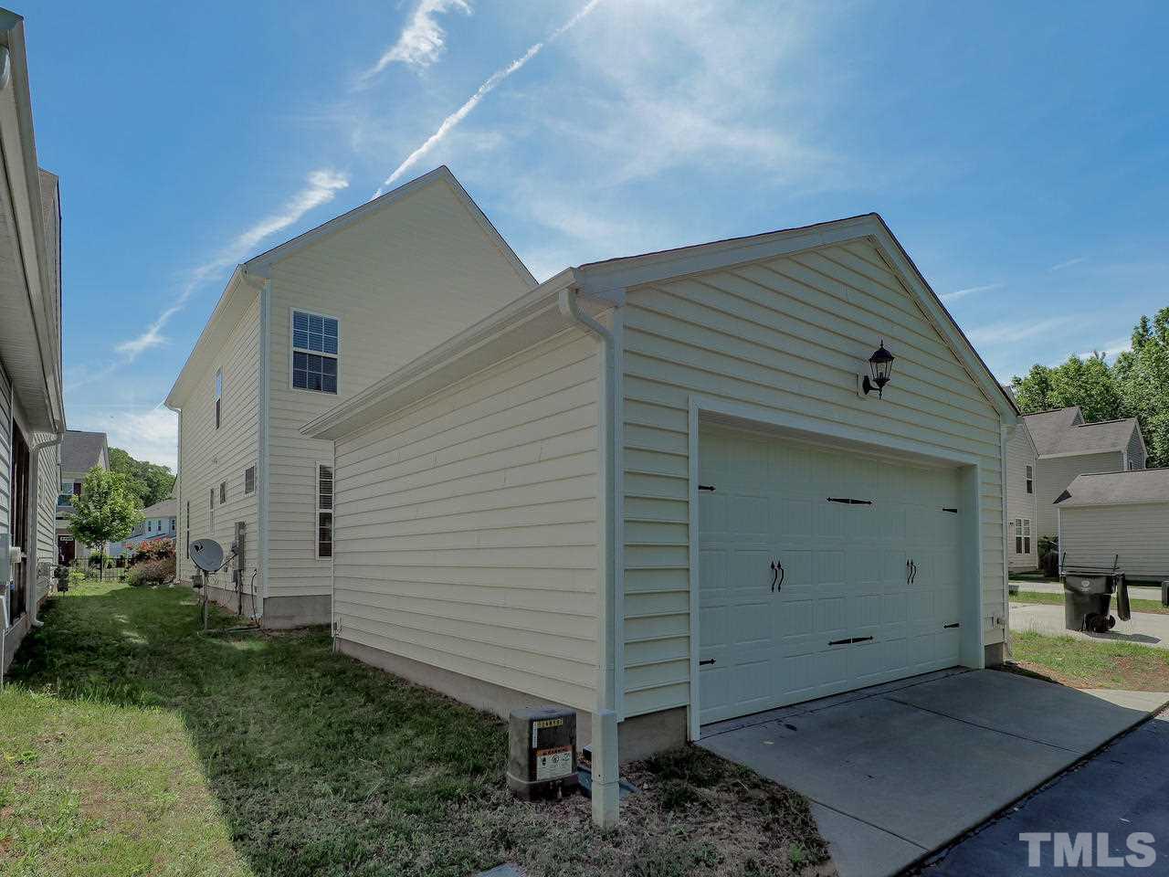 934 Ileagnes Road Raleigh, NC 27603 - Photo 20 of 23 a backyard of a house