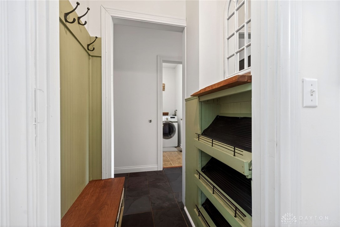 330 South Alpha Bellbrook Road Bellbrook, OH 45305 - Photo 10 of 87 This functional laundry room features convenient washer and dryer appliances with ample storage space.