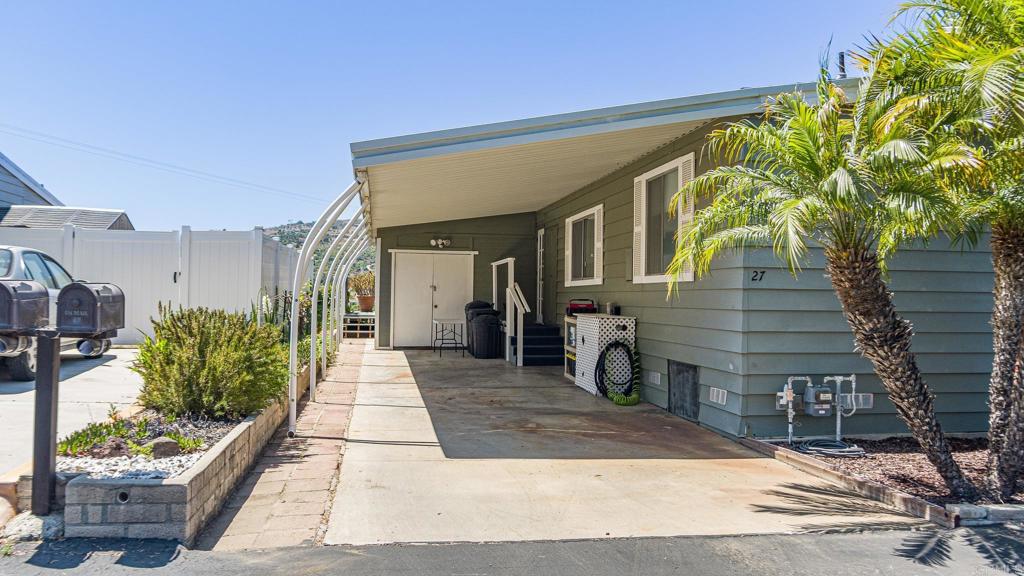 4650 Dulin Road, Unit 27 Fallbrook, CA 92003 - Photo 2 of 37 a front view of a house