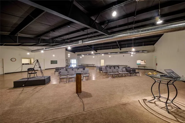 a view of a studio with chairs