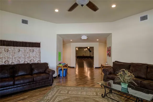 a living room with furniture and a couch