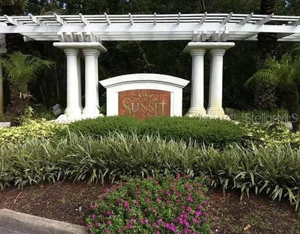 4352 South Kirkman Road, Unit 1204 Orlando, FL 32811 - Photo 23 of 23 a view of a yard with plants