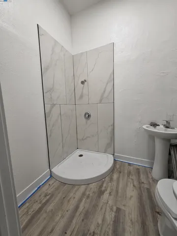 a bathroom with a sink and toilet