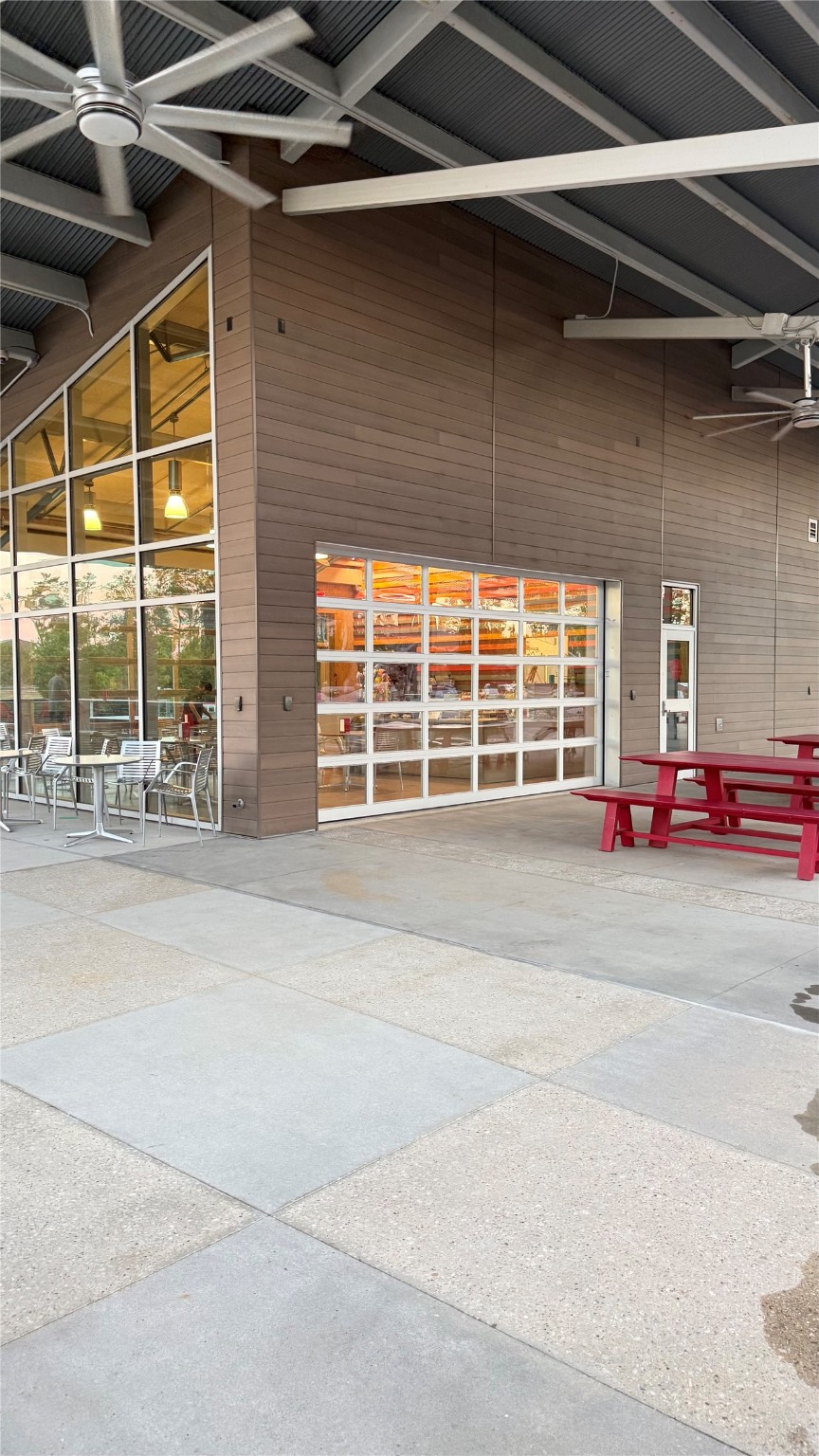 15707 Autumn Sun Court Conroe, TX 77302 - Photo 13 of 13 a outdoor view of a building with a garage