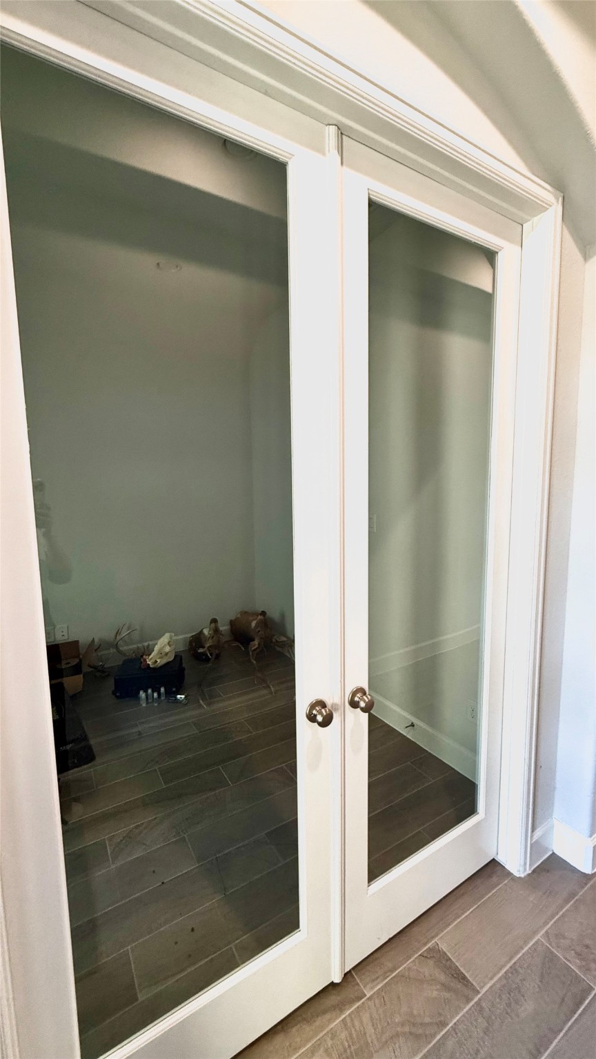 15707 Autumn Sun Court Conroe, TX 77302 - Photo 3 of 13 a bathroom with a glass shower door