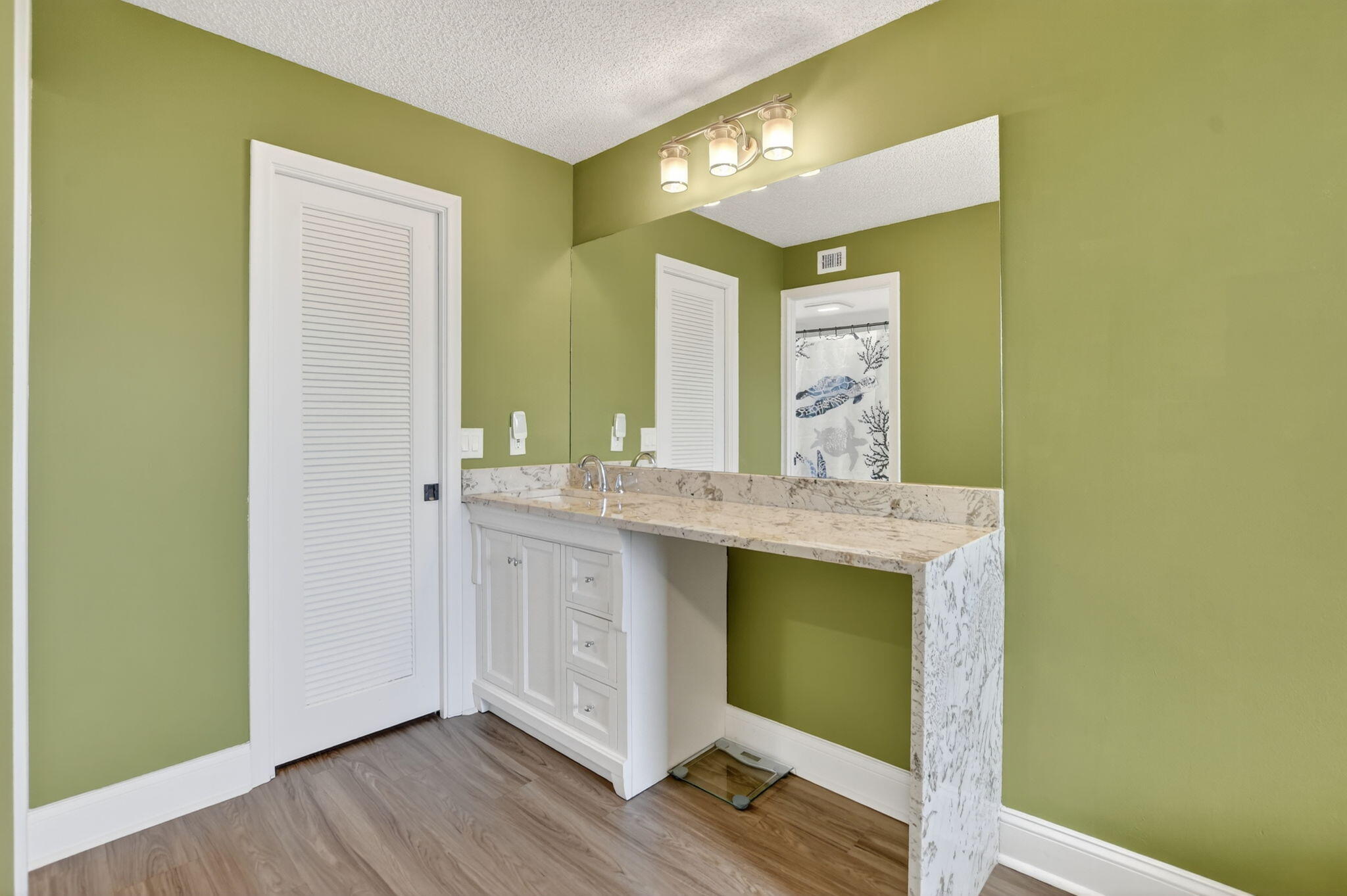 4 Royal Palm Way, Unit 3020 Boca Raton, FL 33432 - Photo 15 of 38 a bathroom with a granite countertop sink and a mirror