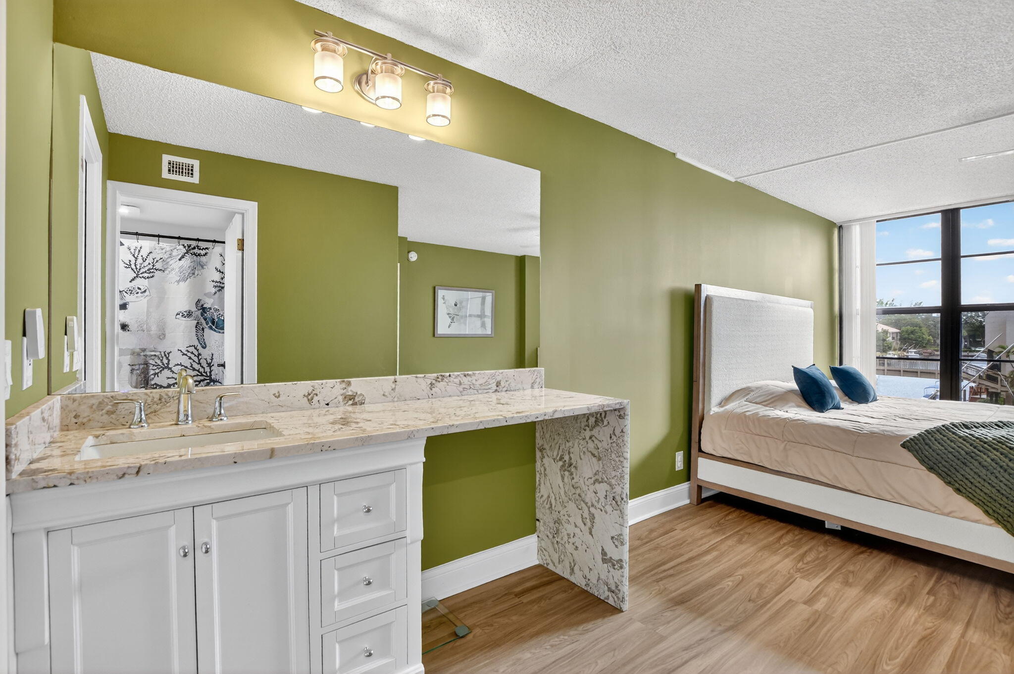 4 Royal Palm Way, Unit 3020 Boca Raton, FL 33432 - Photo 16 of 38 a bedroom with a bed and a dresser