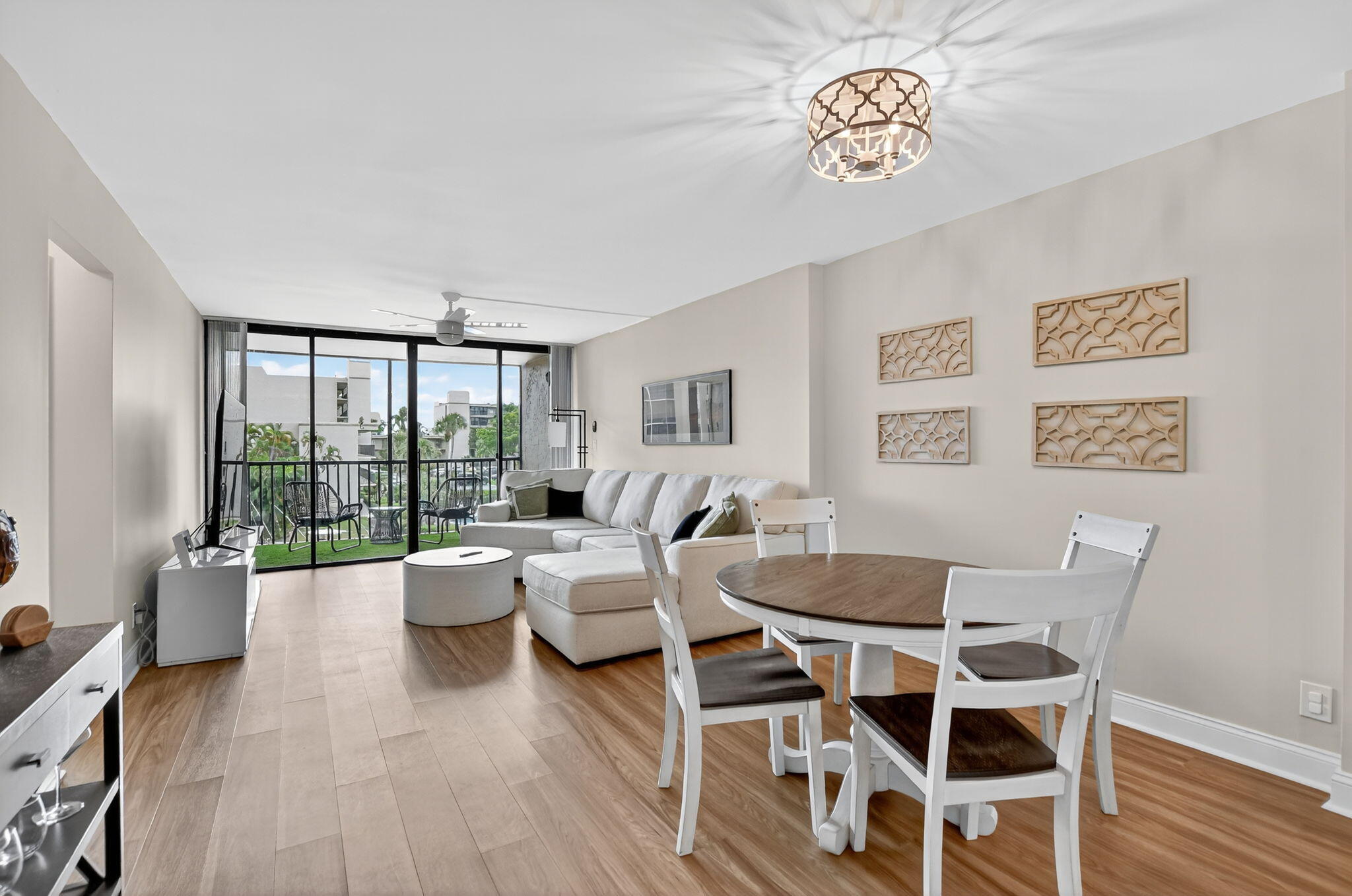 4 Royal Palm Way, Unit 3020 Boca Raton, FL 33432 - Photo 2 of 38 a living room with furniture and a large window