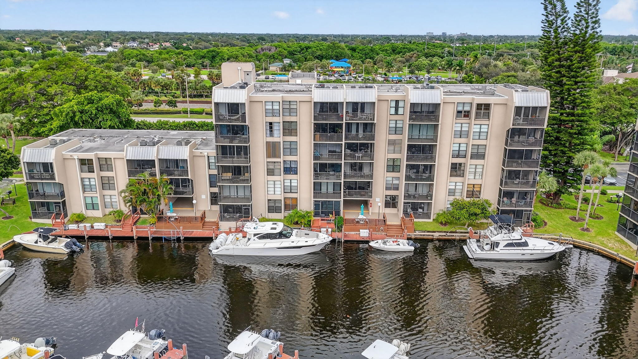 4 Royal Palm Way, Unit 3020 Boca Raton, FL 33432 - Photo 27 of 38 a view of swimming pool with outdoor seating and plants
