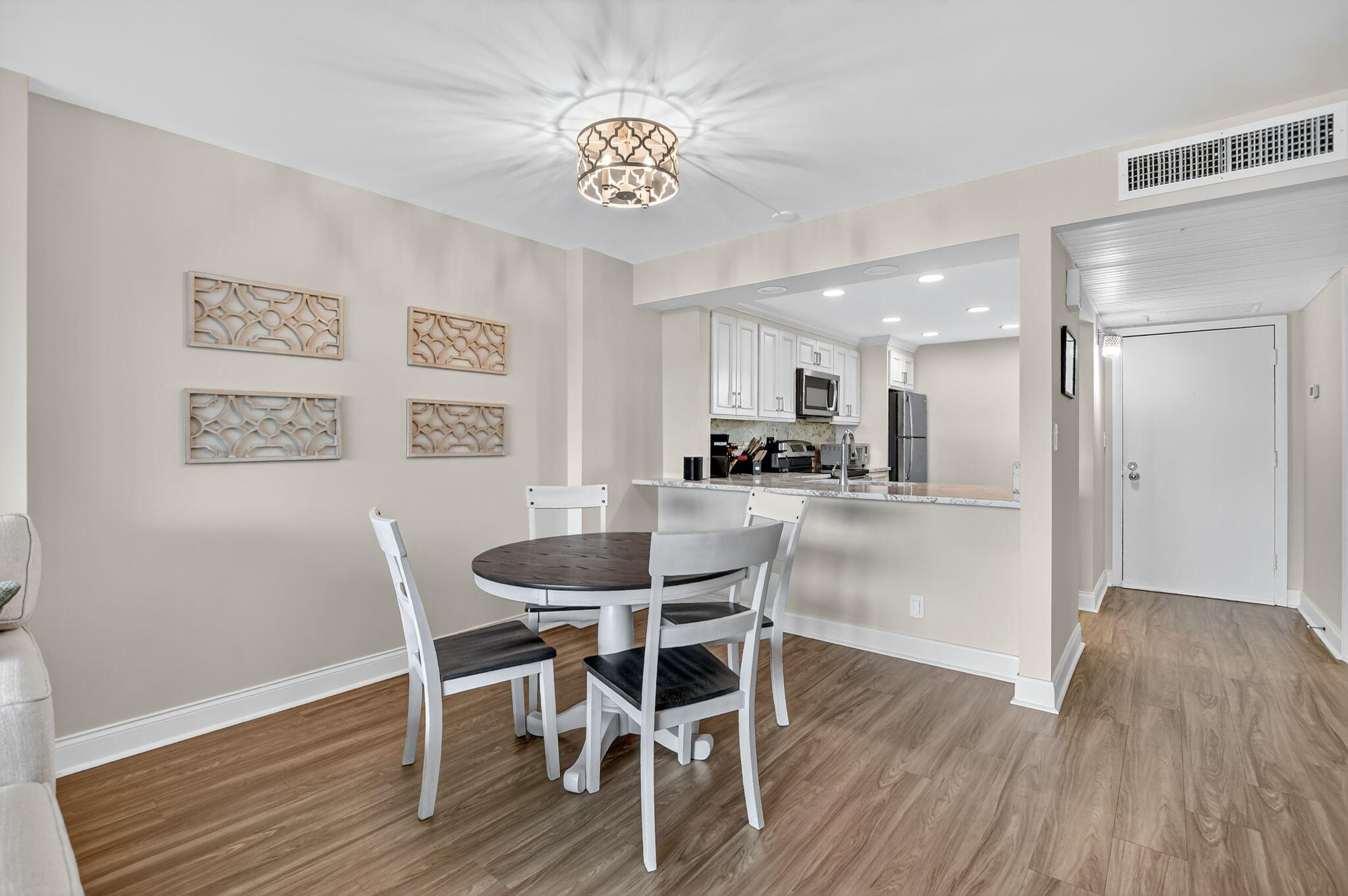 4 Royal Palm Way, Unit 3020 Boca Raton, FL 33432 - Photo 7 of 38 a view of a dining room with furniture and wooden floor