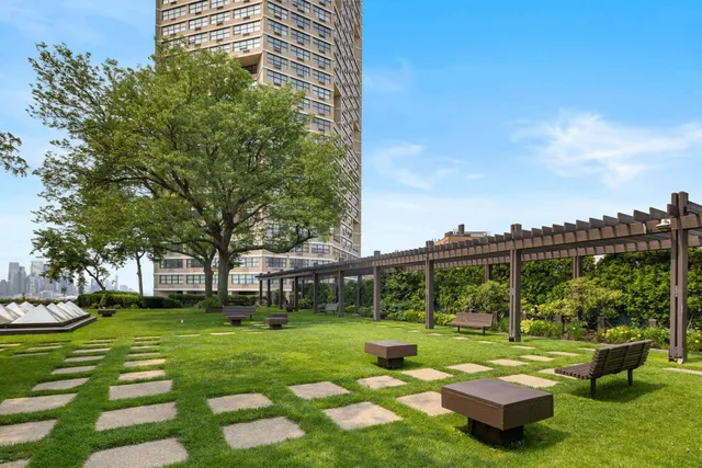 a front view of a building with garden