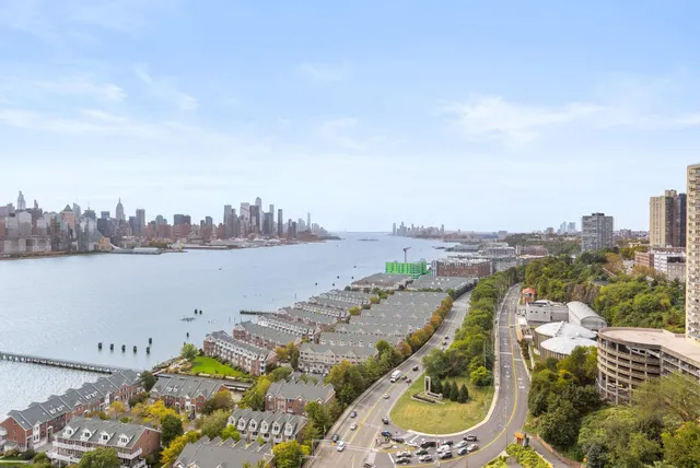 a view of a city with tall buildings