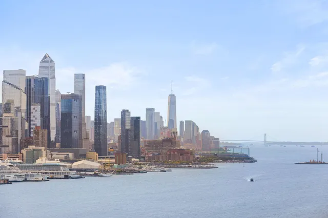 a view of a city with tall buildings in the background