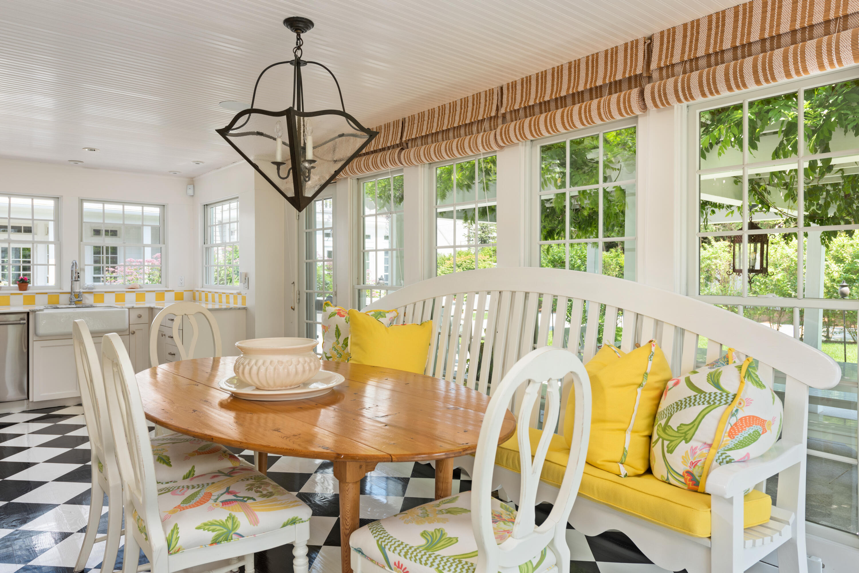32 Dunes Road Harwich Port, MA 02646 - Photo 16 of 56 a view of a dining room with furniture a chandelier and wooden floor
