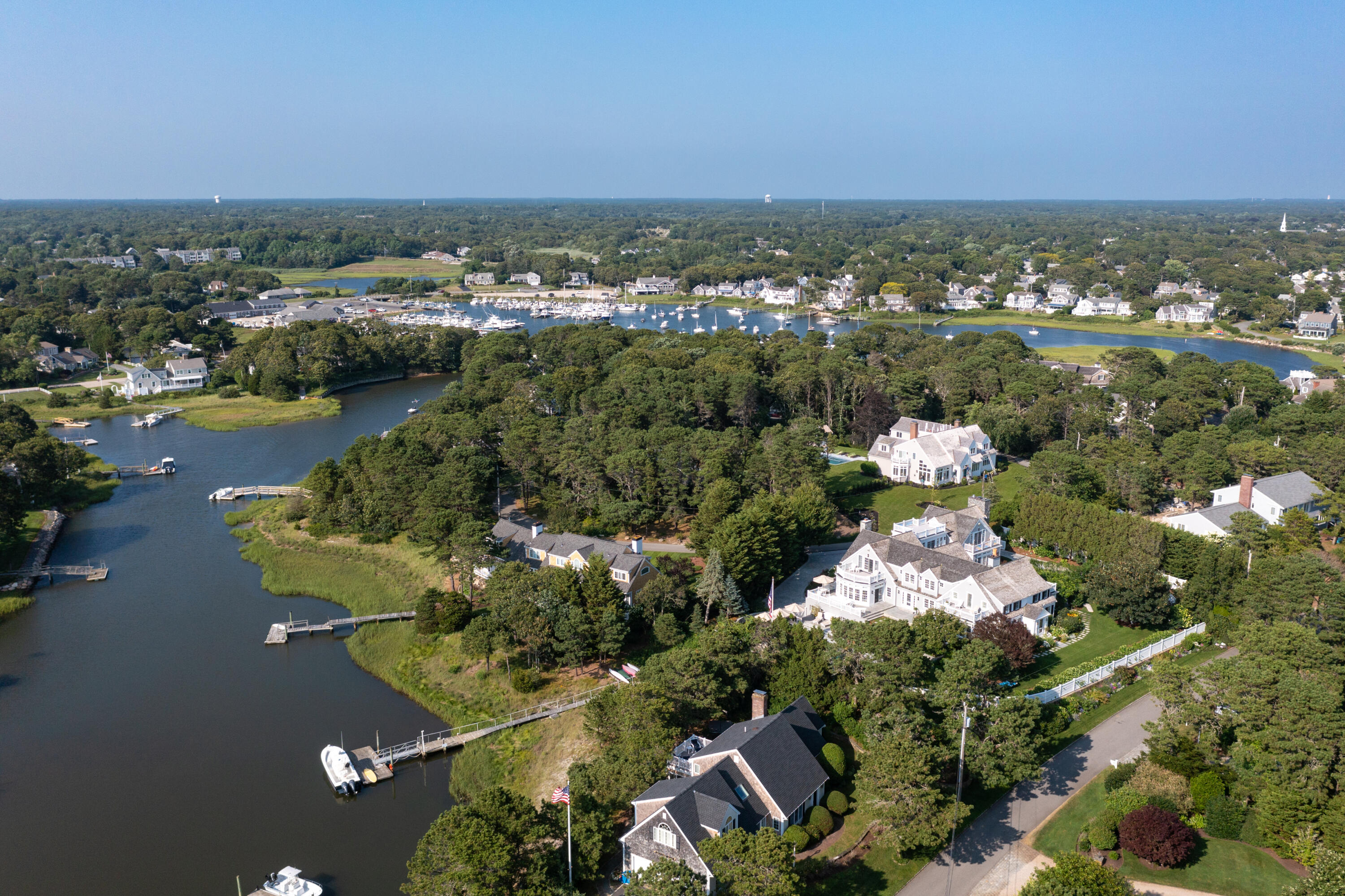 32 Dunes Road Harwich Port, MA 02646 - Photo 2 of 56 an aerial view of a house with a swimming pool outdoor seating and yard