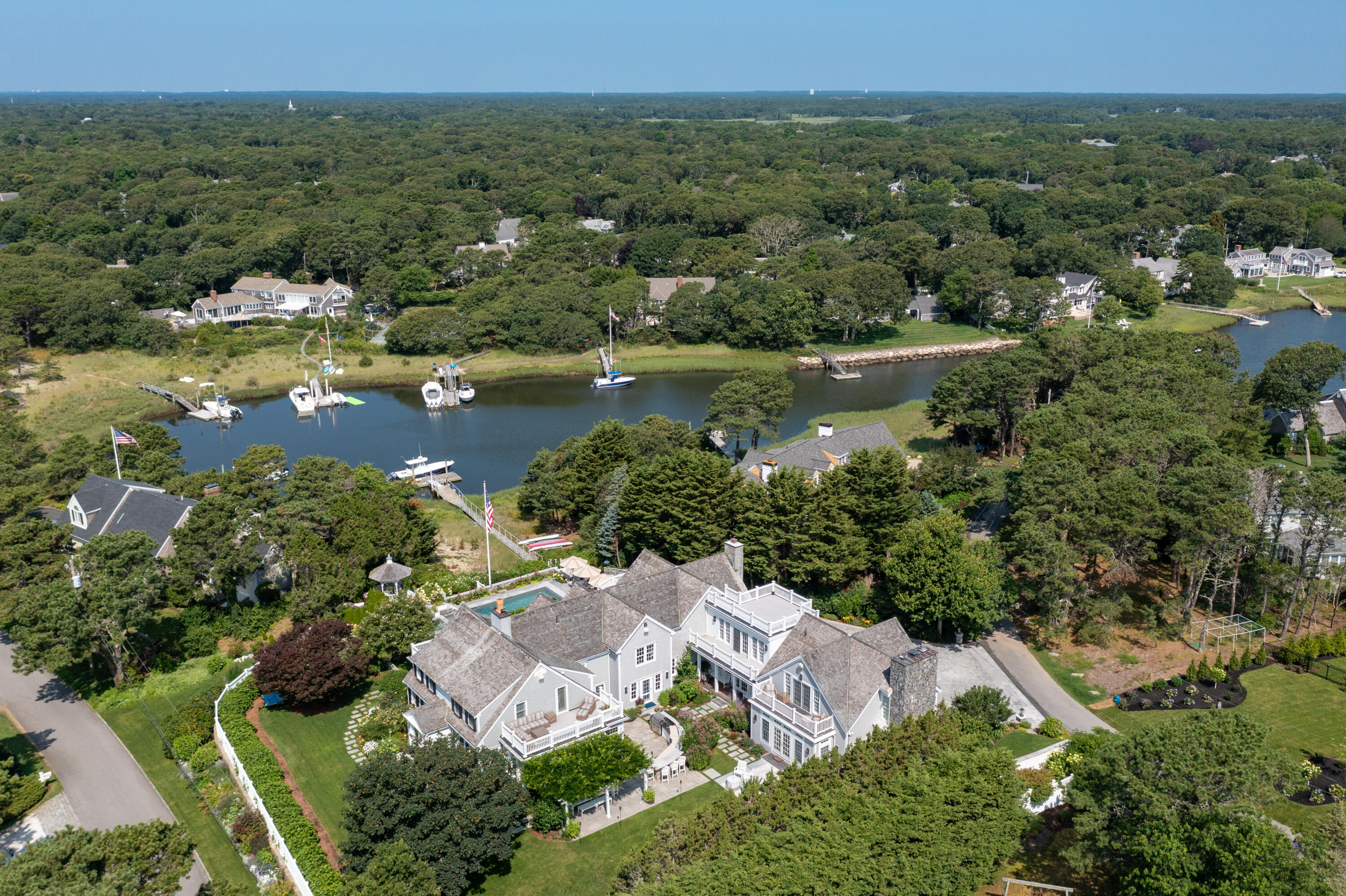 32 Dunes Road Harwich Port, MA 02646 - Photo 4 of 56 an aerial view of residential houses with outdoor space and lake view