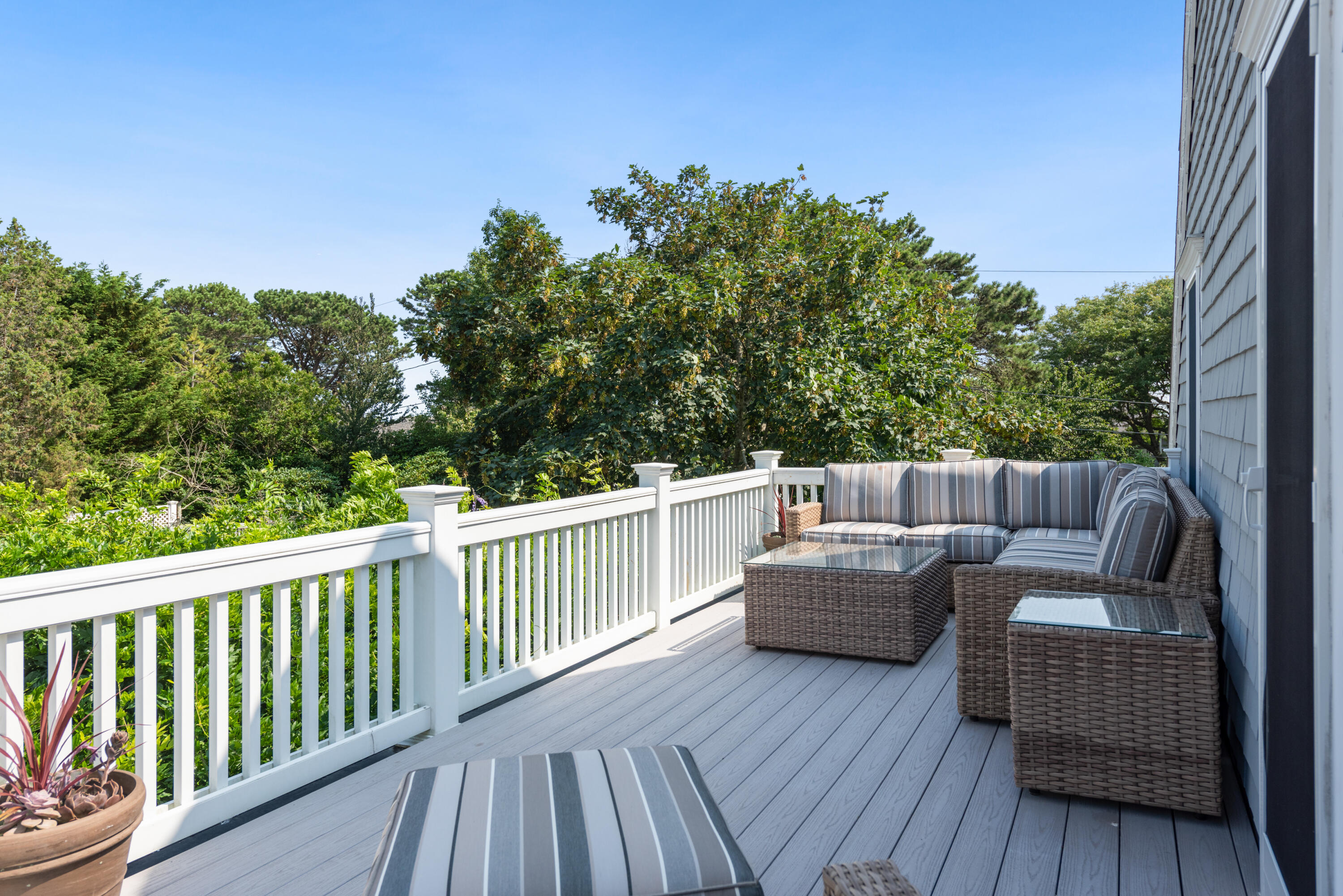 32 Dunes Road Harwich Port, MA 02646 - Photo 41 of 56 a balcony with wooden floor and city view