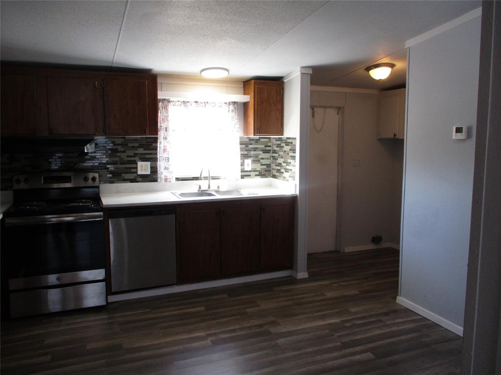 1336 Rains County Road 1530 Point, TX 75472 - Photo 11 of 26 a kitchen with a sink and a stove