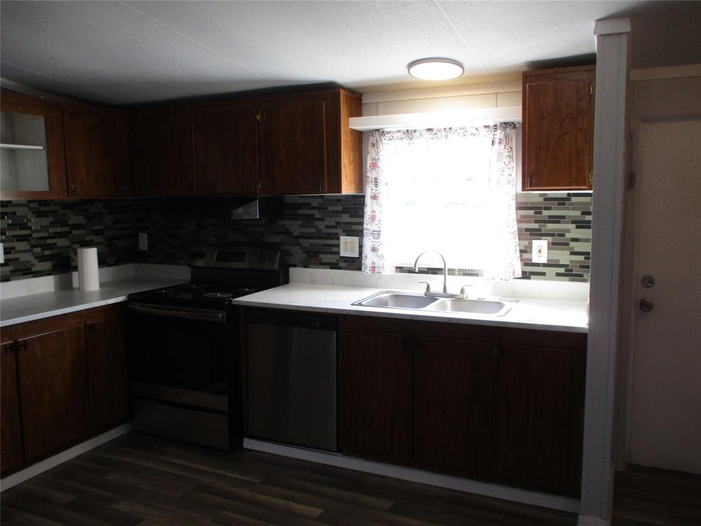 1336 Rains County Road 1530 Point, TX 75472 - Photo 12 of 26 a kitchen with a sink and cabinets