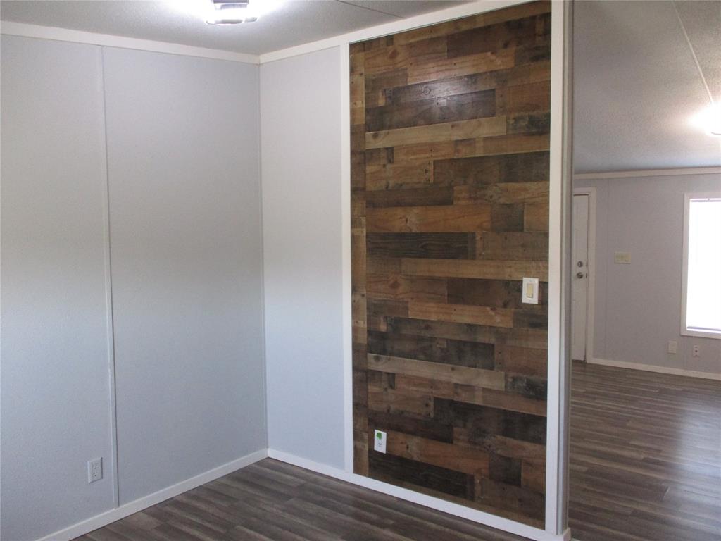 1336 Rains County Road 1530 Point, TX 75472 - Photo 14 of 26 a view of walk in closet with empty racks