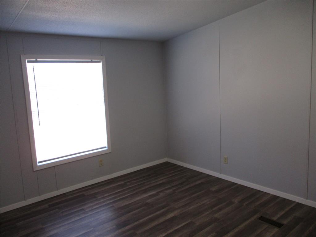1336 Rains County Road 1530 Point, TX 75472 - Photo 16 of 26 a view of a small space with wooden floor and a window