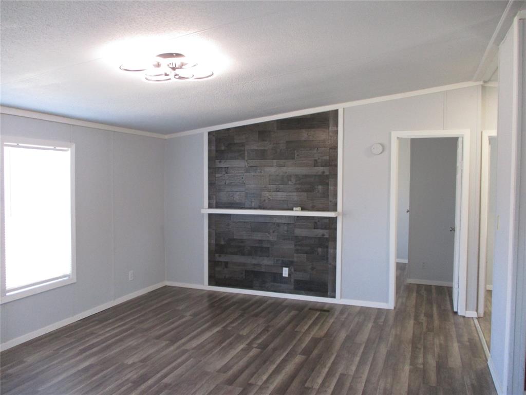 1336 Rains County Road 1530 Point, TX 75472 - Photo 3 of 26 a view of empty room with wooden floor and window