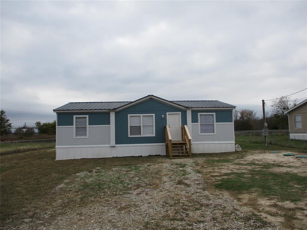1336 Rains County Road 1530 Point, TX 75472 - Photo 4 of 26 a house that has a lot of windows in it