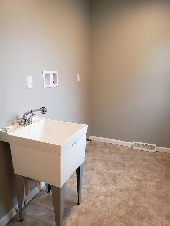 484 Connecticut Avenue Rochester, PA 15074 - Photo 20 of 23 Large main floor laundry room
