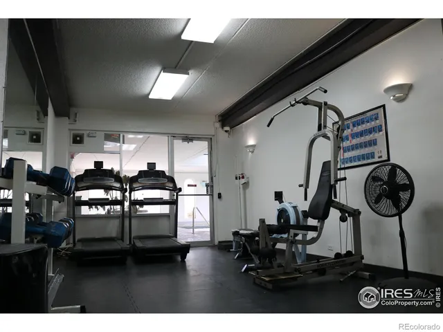 a room with lots of wooden furniture