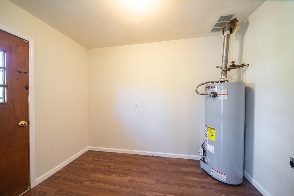 6411 Michael Avenue Columbus, GA 31909 - Photo 14 of 34 a view of small space with wooden floor and chair