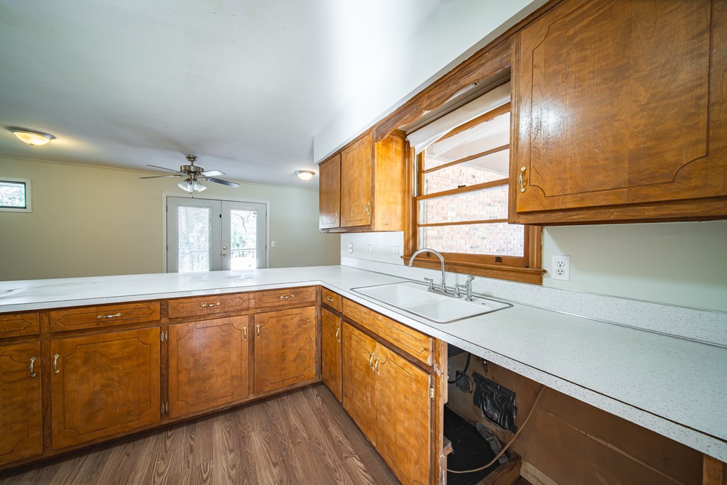 6411 Michael Avenue Columbus, GA 31909 - Photo 25 of 34 a kitchen with a sink and a window
