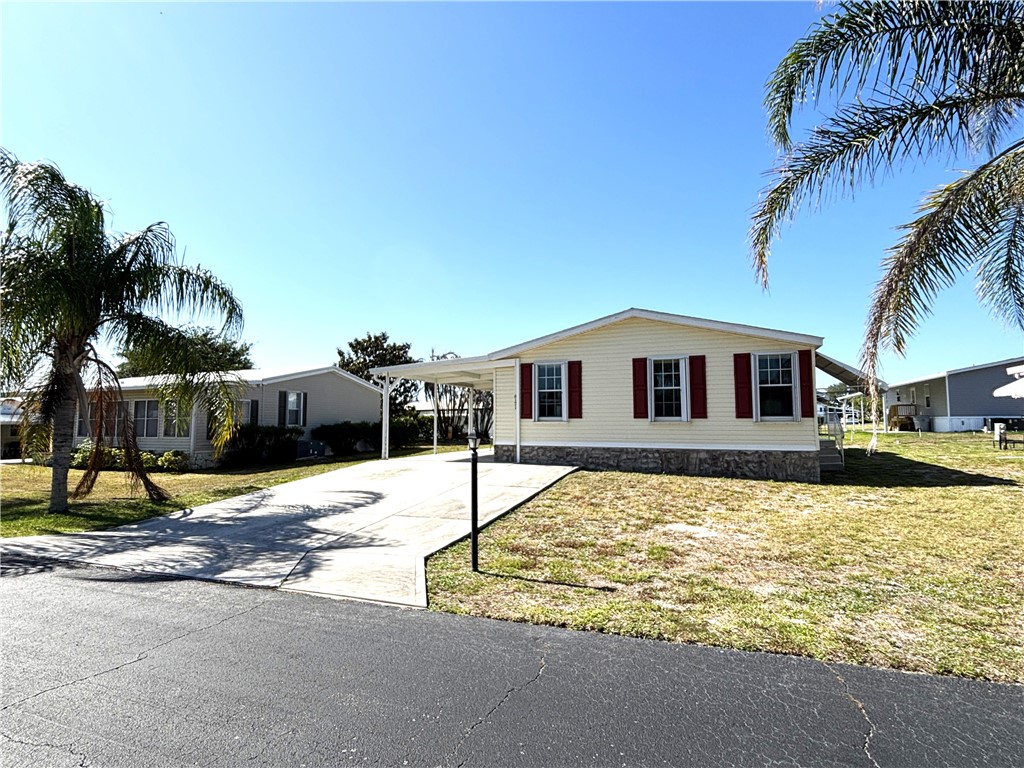 a house with palm tree in front of it