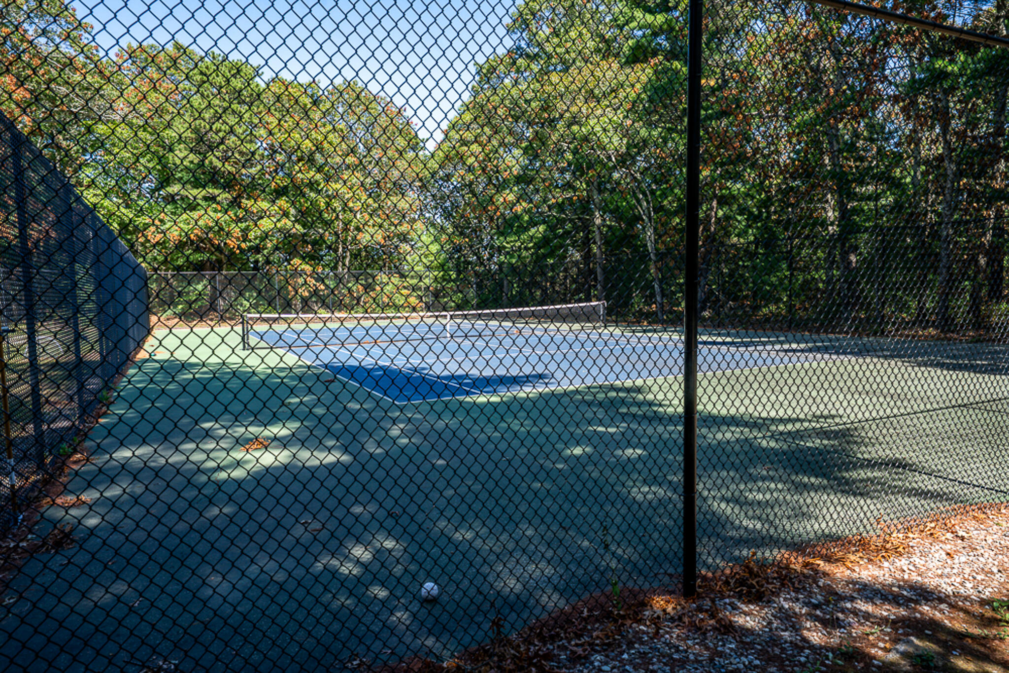 195 Falmouth Road, Unit 9D Mashpee, MA 02649 - Photo 33 of 36 a view of a tennis court