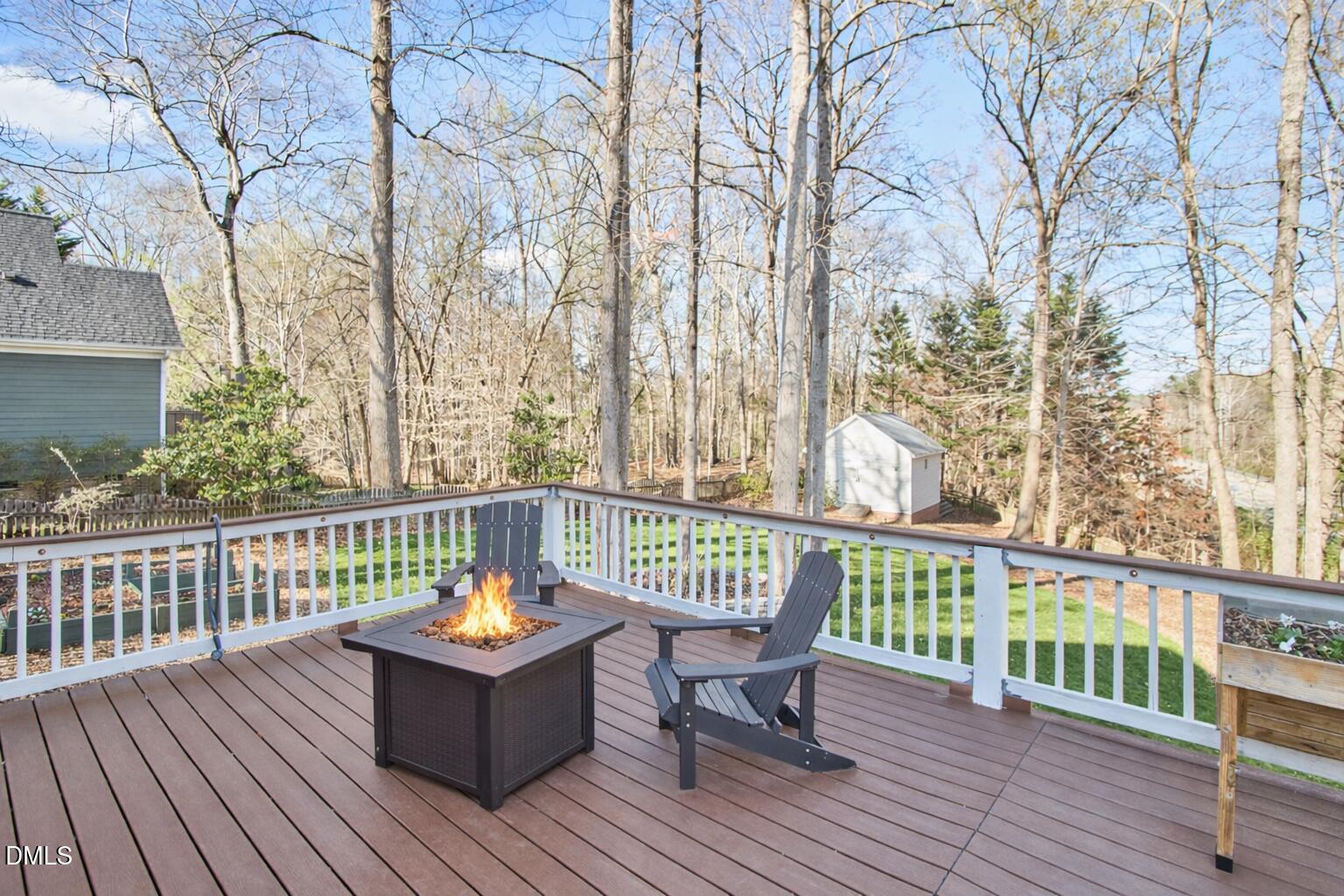 3821 La Costa Way Raleigh, NC 27610 - Photo 32 of 45 a view of a chair and table on the deck