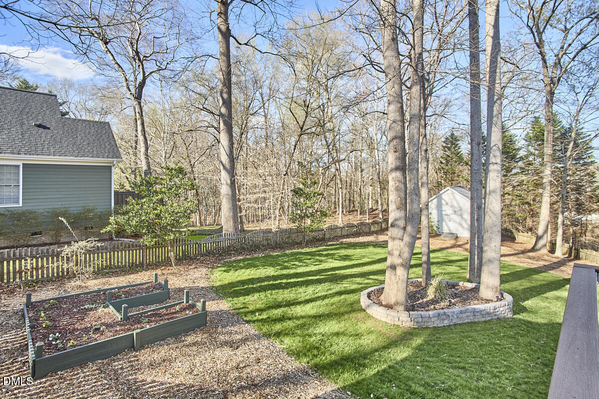 3821 La Costa Way Raleigh, NC 27610 - Photo 36 of 45 a front view of a house with a yard table and chairs