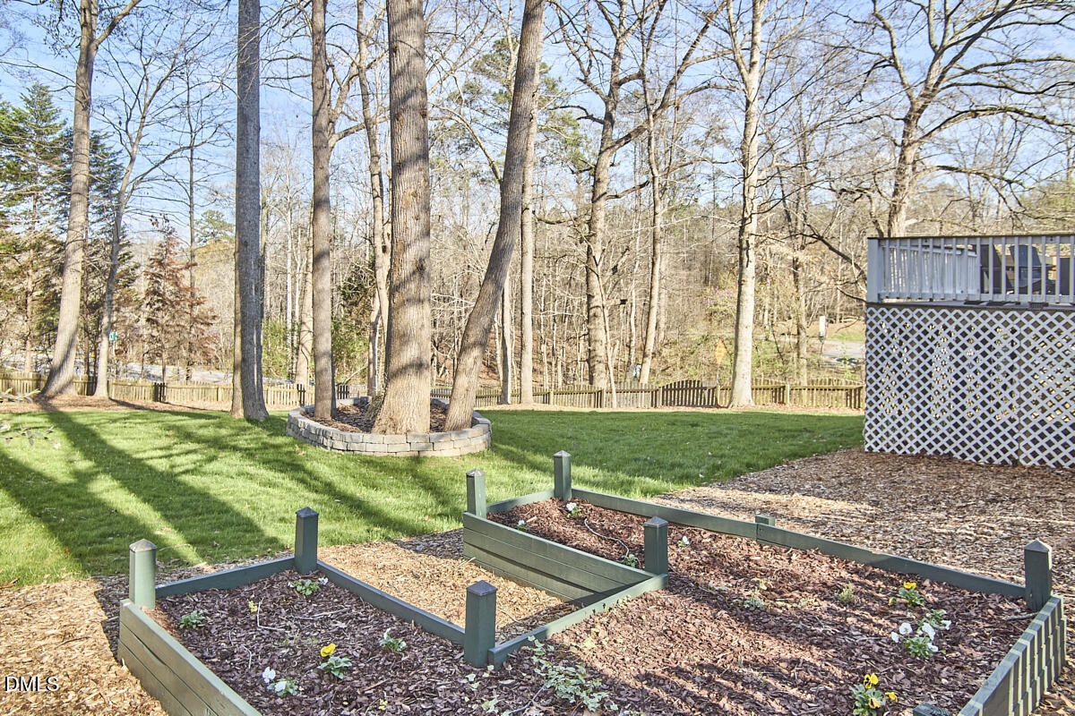 3821 La Costa Way Raleigh, NC 27610 - Photo 38 of 45 a view of a backyard with wooden fence