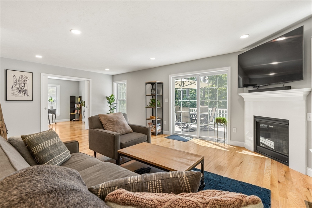 62 Benjamin Road Shirley, MA 01464 - Photo 14 of 37 a living room with furniture and a flat screen tv