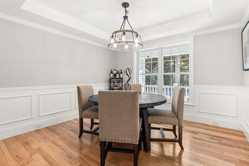 62 Benjamin Road Shirley, MA 01464 - Photo 17 of 37 a view of a dining room with furniture window and wooden floor