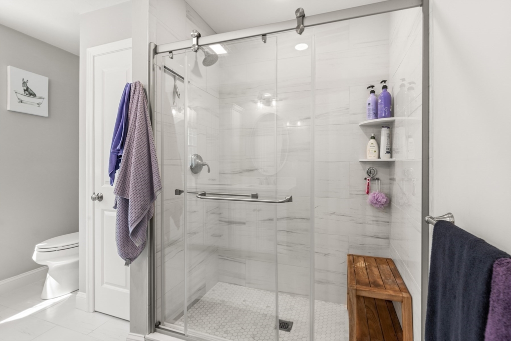 62 Benjamin Road Shirley, MA 01464 - Photo 26 of 37 a bathroom with a shower a toilet and a shower