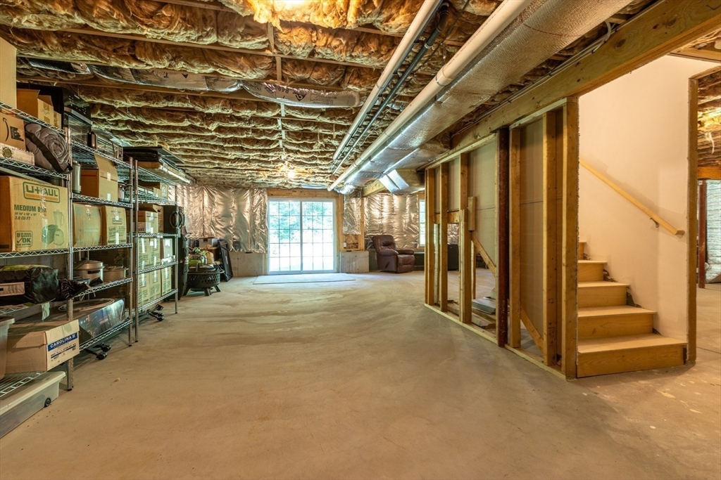 62 Benjamin Road Shirley, MA 01464 - Photo 33 of 37 a view of an empty room with a window