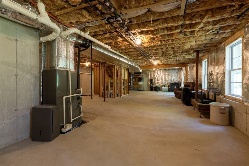 62 Benjamin Road Shirley, MA 01464 - Photo 35 of 37 a view of a room with gym equipment