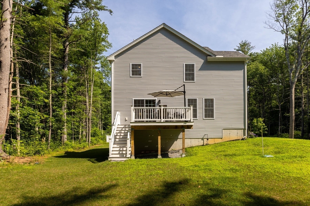62 Benjamin Road Shirley, MA 01464 - Photo 37 of 37 a view of a house with a yard