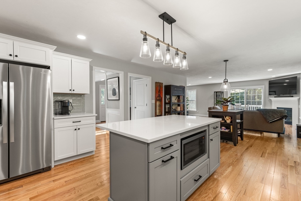 62 Benjamin Road Shirley, MA 01464 - Photo 8 of 37 a kitchen that has a lot of cabinets a sink and appliances