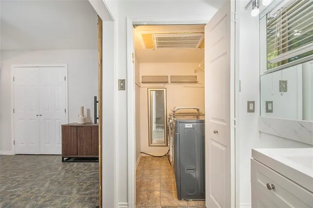 a view of a bathroom with a door