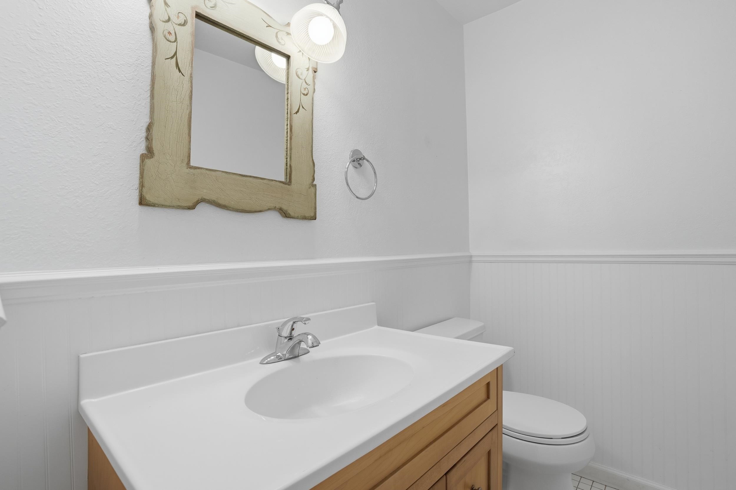 3401 Bermuda Avenue, Unit 6 Davis, CA 95616 - Photo 25 of 43 a bathroom with a sink a toilet and mirror