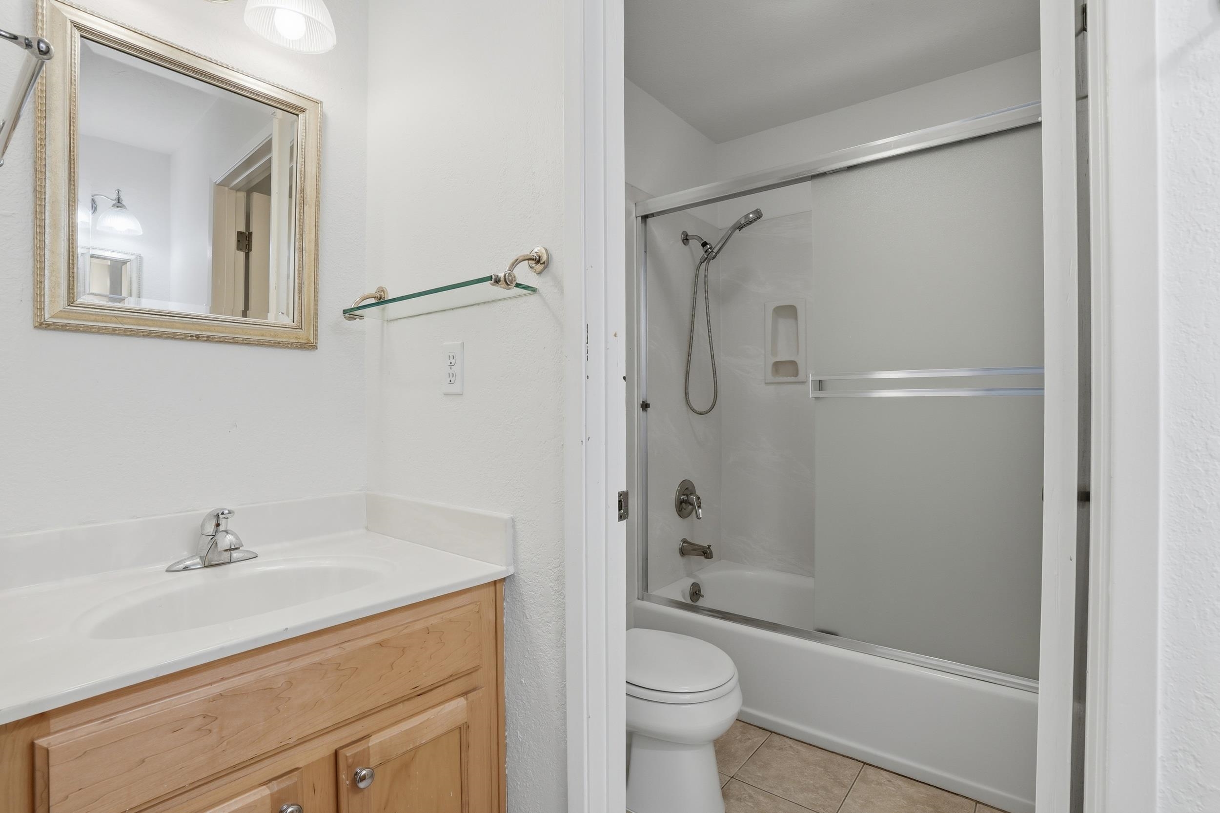 3401 Bermuda Avenue, Unit 6 Davis, CA 95616 - Photo 30 of 43 a bathroom with a sink toilet and shower