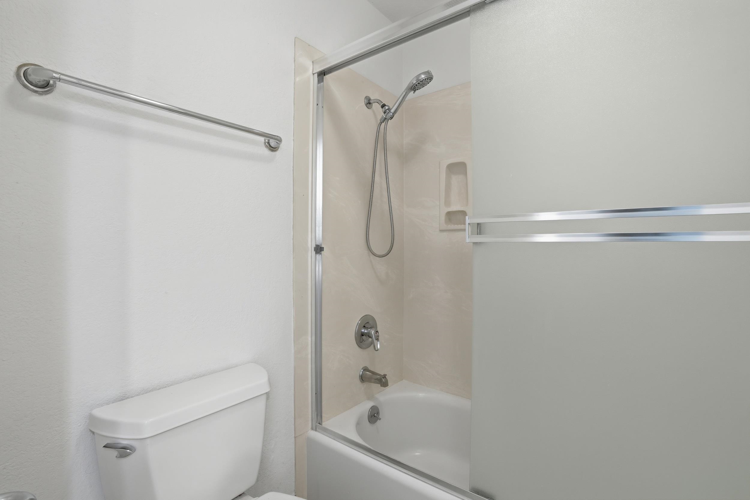 3401 Bermuda Avenue, Unit 6 Davis, CA 95616 - Photo 32 of 43 a bathroom with a shower and a toilet