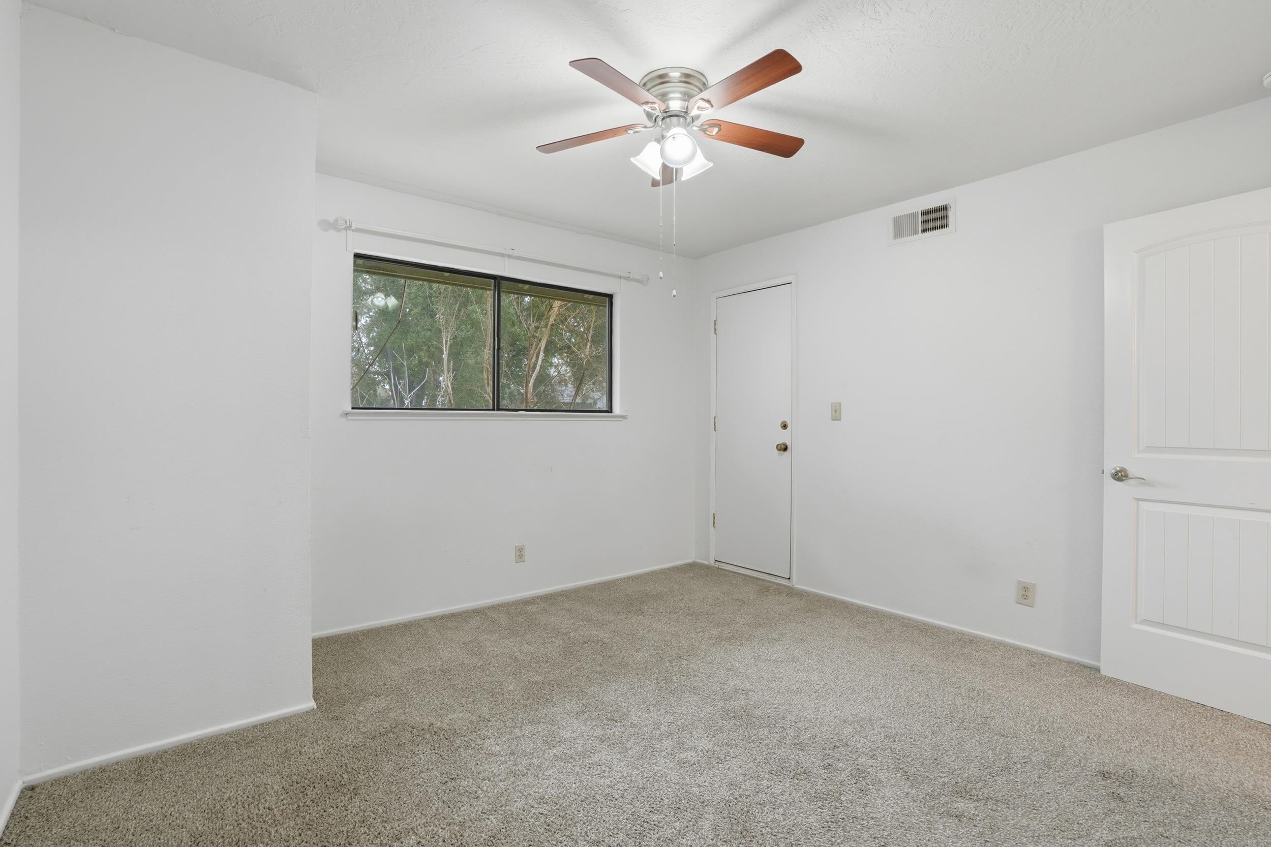 3401 Bermuda Avenue, Unit 6 Davis, CA 95616 - Photo 37 of 43 a view of an empty room with a window